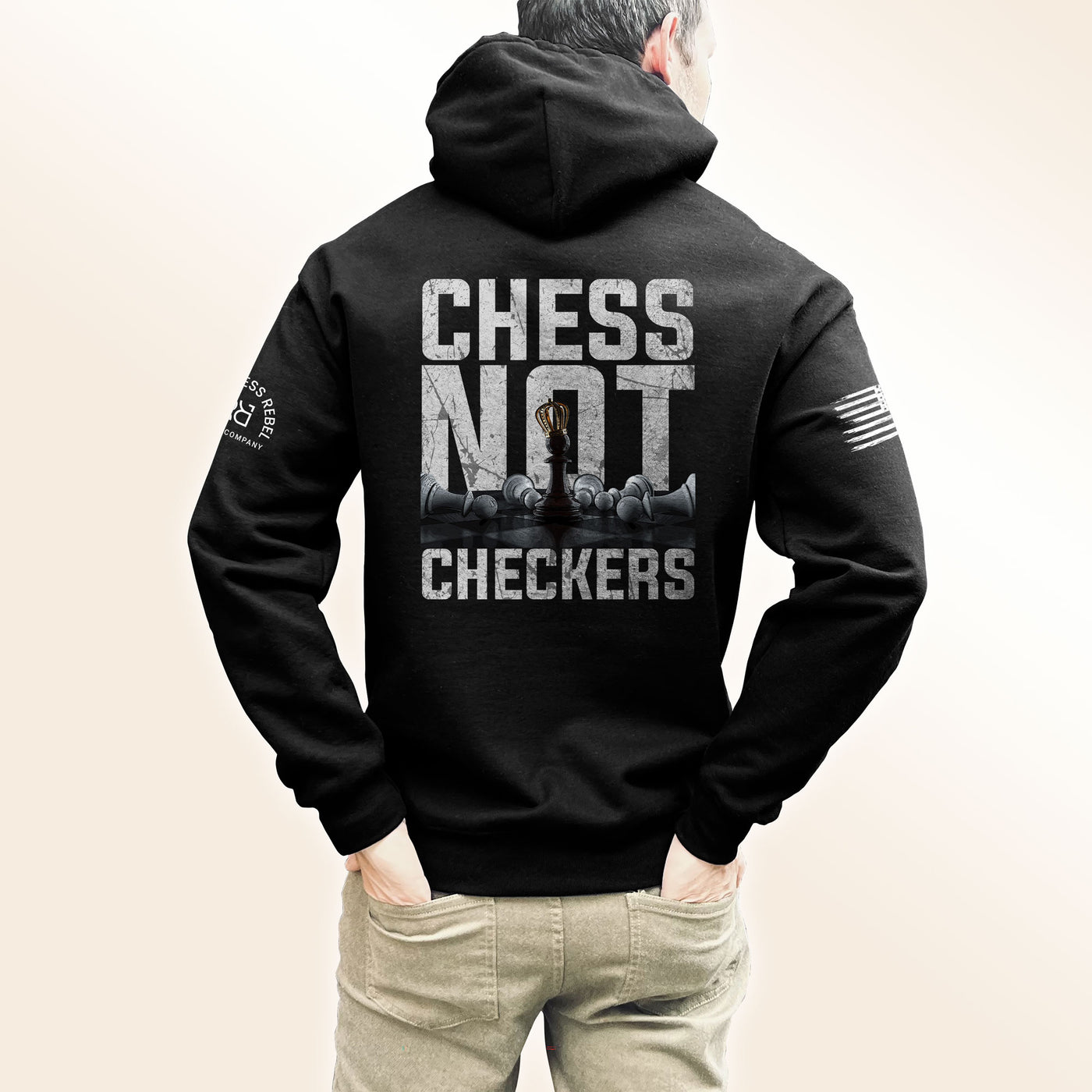 Man wearing Solid Black Men's Chess Not Checkers Back Design Hoodie