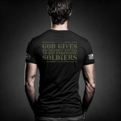 Man wearing Solid Black Men's God Gives His Toughest Battles Back Design Tee