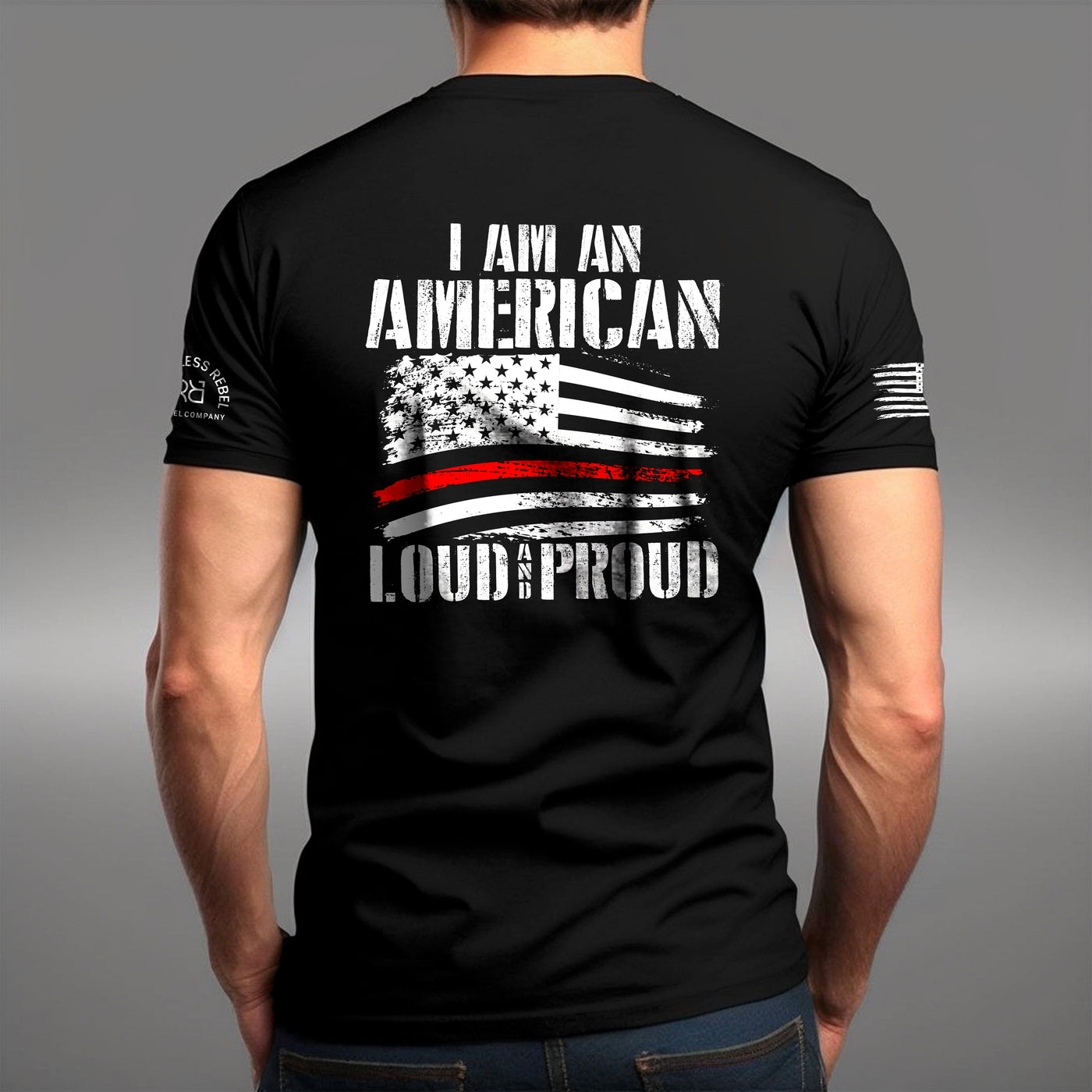 Man wearing Solid Black Men's I Am An American Loud and Proud Back Design Tee