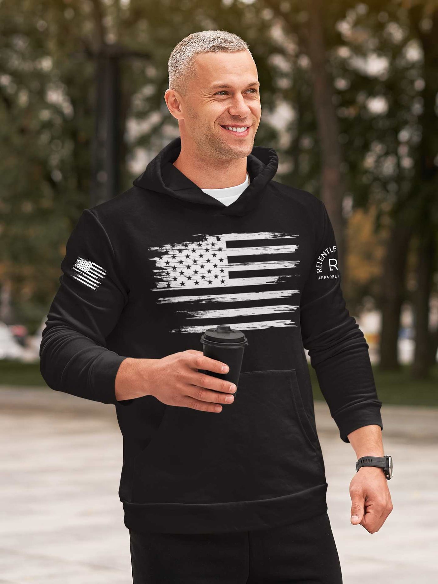 Man wearing Solid Black Men's Rebel Patriot Flag Front Design Hoodie