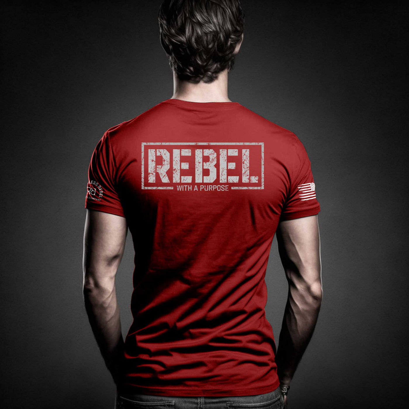 Man wearing Heather Red Men's Rebel With A Purpose Back Design Tee